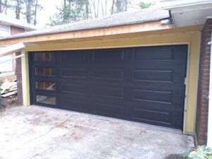 Brown garage door with side windows Brown garage door with side windows