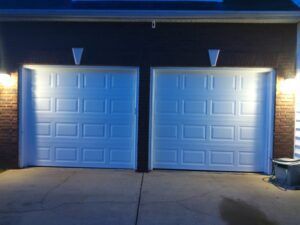 White garage door with lamp White garage door with lamp